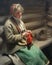 Girl knitting, 1901 painting by Anders Zorn