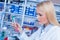 Girl laboratory Assistant.works with an antiviral drug in a laboratory