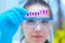 Girl laboratory Assistant.works with an antiviral drug in a laboratory