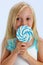 Girl with large lollipop