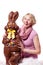 Girl Laughing and Holding a HUGE Chocolate Easter Bunny