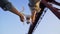 Girl launching drone from hands under bridge