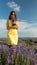 Girl in Lavender field in yellow