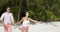 Girl Lead Man On Beach Holding Hand, Couple In Love Happy Smiling Tourists Summer Holiday