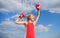 Girl leader promoting feminism. Woman boxing gloves raise hands blue sky background. Girl boxing gloves symbol struggle