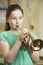 Girl Learning To Play Trumpet In School Music Lesson