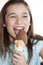 Girl Licking Delicious Chocolate Ice Cream