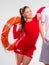 Girl lifeguard with rescue equipment