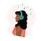 Girl listening to music. Young adult african american woman witn headphones smiling and enjoying music