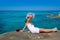 Girl looking at beach in Formentera turquoise Mediterranean