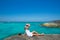 Girl looking at beach in Formentera turquoise Mediterranean