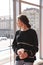 Girl looks at Altmarkt square in Dresden, Germany