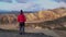 A girl looks at the beautiful landscape Landmannalaugar nature