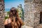 Girl looks at San Marino, Guaita, first of three peaks which overlooks the city