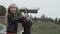 Girl looks into the telescope at the viewing place