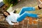 Girl lying on brick banisters