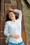 Girl lying on brick banisters