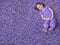Girl lying on purple flowers