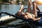 girl lying in a sailing catamaran