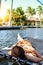 girl lying in a sailing catamaran