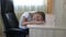 Girl lying on table. Young girl tired study. Caucasian girl lying down. Sad face closeup shot. Back to school concept