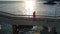 Girl Makes Selfie on Bridge by Sunlight Reflection