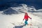 Girl makes ski mountaineering alone toward the mountain pass in a nice track with sealskin