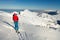 Girl makes ski mountaineering alone toward the mountain pass in a nice track with sealskin