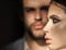 Girl with makeup, eyeshadows, blush, foundation. Woman face profile with blurred man on background. Couple of fashion