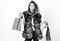 Girl makeup furry coat shopping white background. Shopping or birthday gifts. Woman shopping luxury boutique. Lady hold