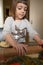 Girl making cookies with mother