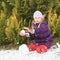Girl making snow ball