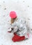 Girl making snow ball