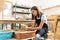 Girl Manufacturing Clay Product On Pottery Wheel