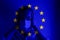 Girl in a mask against the background of the EU flag. Fear of illness, corona virus 2019-2020. Virus, outbreak and mass disease,