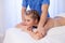 Girl masseur doing massage in spa health