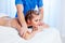 Girl masseur doing massage in spa health