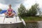 girl meditate on bow of cutter