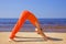 Girl meditating on the beach