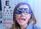 Girl in messbrille glasses in ophthalmology clinic
