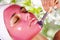 Girl with moistening fruit facial mask