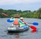 Girl with mother kayaking