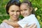 Girl with mother in park