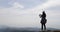 Girl On Mountain Top, Female Tourist Taking Photo Of Morning Landscape With Sunrise On Cell Smart Phone