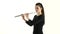 Girl musician playing on flute standing sideways on white background