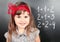 Girl Near Blackboard Learning Mathematics