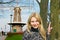 Girl near windmill in Dutch town of Gorinchem.