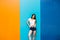 girl with nice body against color wall background