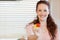 Girl offering a mouthful of salad