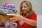 Girl opening birthday presents